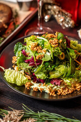 Fresh festive mixed greens salad with crispy topping