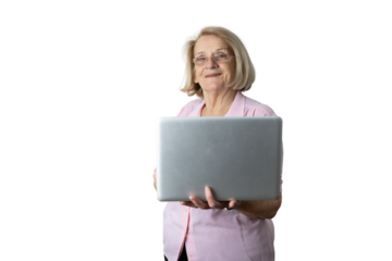 Senior woman smiling embracing digital literacy holding laptop