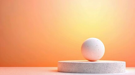 A white sphere rests on a concrete pedestal against an orange and yellow gradient background, lit with soft, warm light.