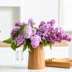 A vibrant bouquet of fresh purple lilac flowers in a wooden vase on a kitchen counter.