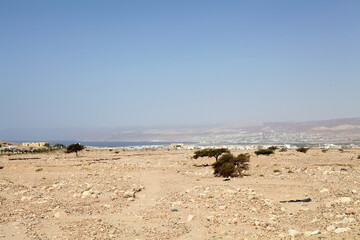 Jordanian desert with Aqaba , Red Sea and Eliat in the background, Jordan and Israel