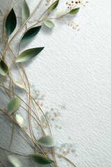 Elegant Greenery with Delicate Leaves and Twigs on a Textured White Background