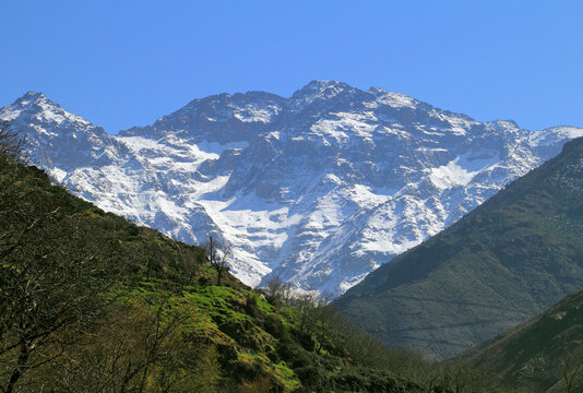 Morocco, High Atlas Mountains, Snow covered peaks of Toubkal National Park. Toubkal Mountain - Jebel Toubkal at 4,167 m is the highest peak in Morocco, North Africa and the Arab world.