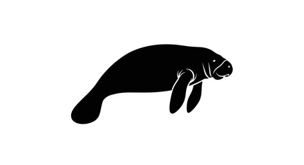 Silhouette of a Manatee Swimming in the Ocean.
