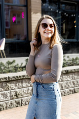 Portrait of Woman in Sunglasses Outdoors