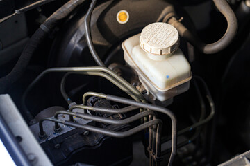 ABS Anti lock braking system. close up of an automotive braking module, intricate mechanical parts that represent advanced vehicle safety design