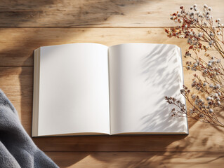 Open notebook with blank pages on a wooden desk, soft winter light, minimal planning aesthetic.