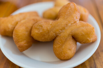 The breakfast made from fried flour is called Patongo on plate