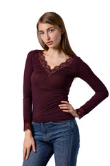 Obraz premium Slavic woman in burgundy lace top and jeans