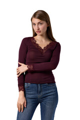 Slavic woman in burgundy lace top and jeans