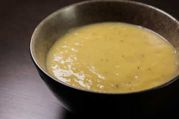 Creamy Potato and Leek Soup on Dark Background – Cozy Comfort Food