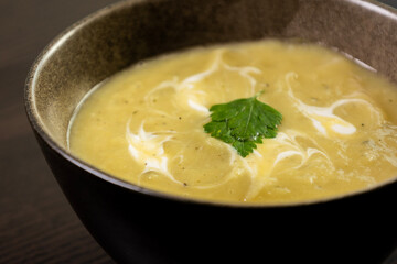 Potato and Leek Soup with Cream in Bowl – Cozy Comfort Food