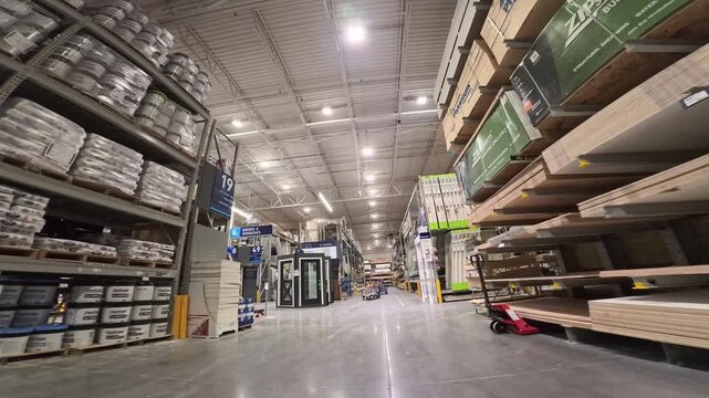 Witness a hyperlapse journey through a vast hardware store filled with supplies for home projects and renovations.
