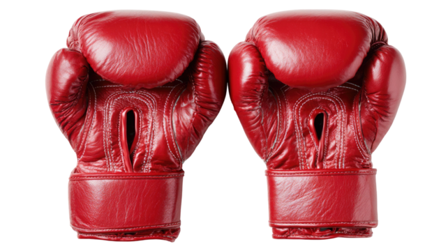 Red boxing gloves featuring padded leather surface, athletic training detail, and durable striking construction isolated on white background.