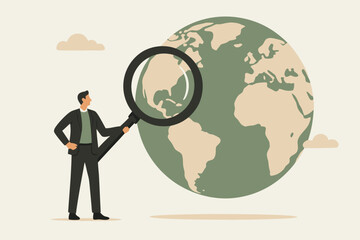 Modern professional examining world globe with magnifying glass for global business expansion, research, or investment strategy