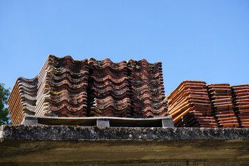 Stacked Clay Roof Tiles Awaiting Use
