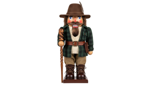 Isolated wood nutcracker doll, German, festive Christmas decoration, collectible holiday gift