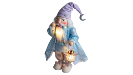 Isolated holiday sleepy nutcracker doll in nightwear with lantern, holiday home decor