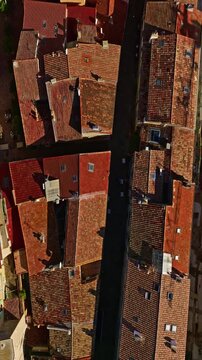  Aerial view of red roofs of houses in the historic center of Hyeres, France