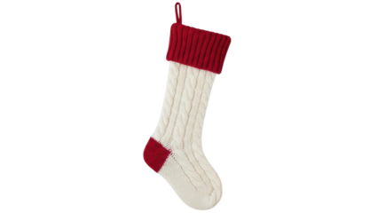Isolated festive cable knit Christmas stocking with red cuff and toe for holiday season