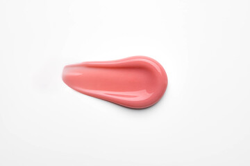 Sample of cosmetic lip gloss isolated on white. trendy color