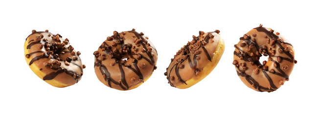Four chocolate donuts sit neatly in a row, each garnished with crunchy toppings and drizzled with...