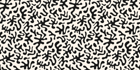 Fototapeta premium Abstract black and white seamless pattern with organic shapes, funky chaotic doodle elements. Groovy cut-out texture. Simple vector minimal background. Repeated geo design for textile, carpet, print