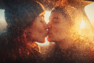 Couple Sharing a Kiss in Winter Through Icy Window