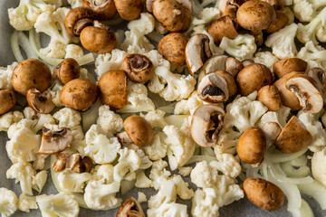 Raw Cauliflower, Mushrooms, and Onion on Tray – Seasoned and Ready to Roast