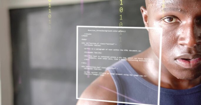 Studying developer in dark blue sleeveless shirt viewing code UI panel in studio with binary digits