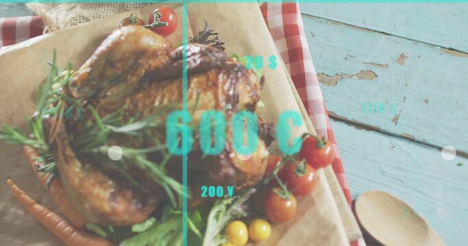 Fototapeta Showing whole roasted chicken with rosemary and tomatoes on pale-blue table, teal overlay labels