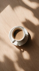 Cup of fresh coffee with foam over table ornate with shadows. Top view. Generative AI image