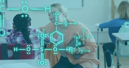 Crouching teacher leaning toward girl at school, holding tablet with chemical overlay, plaid shirt