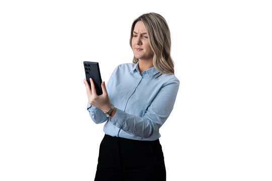Woman squinting at phone reflecting confusion and bad news