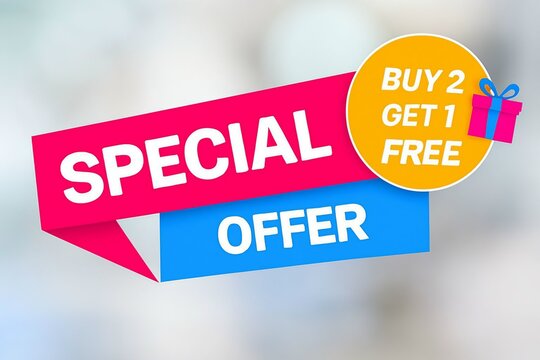 Brightly colored special offer sign with buy two get one free promotion and gift box illustration on a blurred background