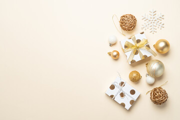 Christmas present and balls, golden decorations.