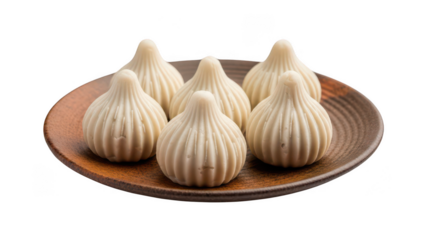 Plate of modak traditional indian sweet isolated on transparent background