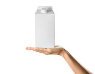 Hand holding blank white carton of milk or juice product isolated on transparent background