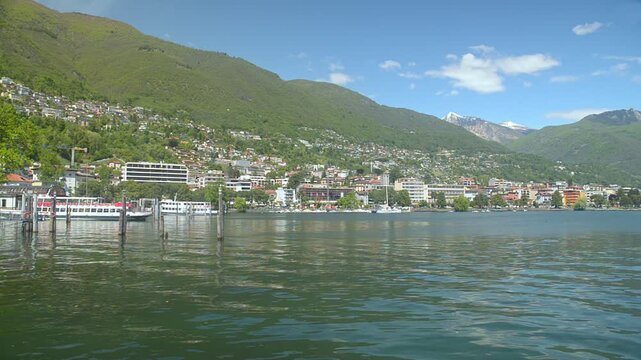 Locarno city on Lake Maggiore, Switzerland. The ferry departure point is visible on the left. Locarno is an important tourist city on a big lake, in southern Switzerland, in the canton of Ticino