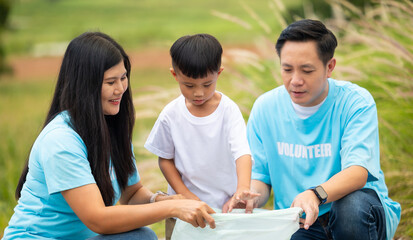 Asian family, Family team and plastic bag for cleaning with social responsibility, accountability with trash, garbage or dirt. volunteer charity people. charity community service event, ngo business 
