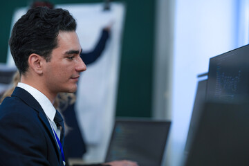 Intense focus zone. Two diverse professionals analyze complex data streams monitor screens side by side powerful synergy driving project success modern tech office environment pulse.