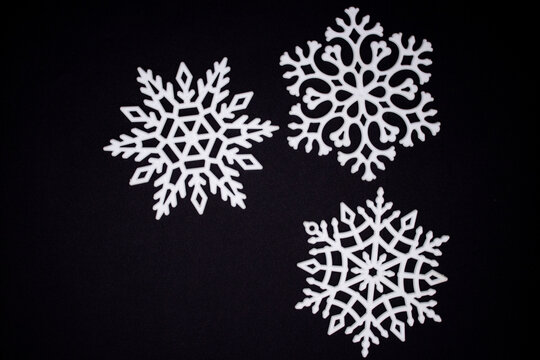 snow flakes on black background