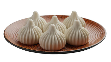 Six khinkali dumplings on a rustic plate isolated on transparent background
