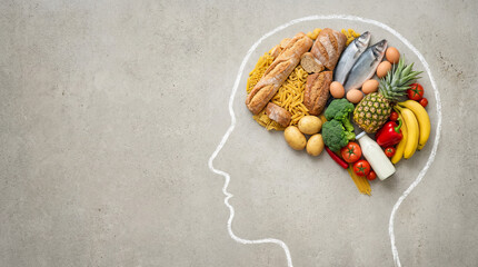 Brain food and healthy diet concept for mental wellness. A variety of fresh foods arranged in a human head shape.