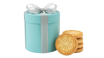 Isolated round Tiffany blue box tied with silver ribbon with stack of flower decorated cookies