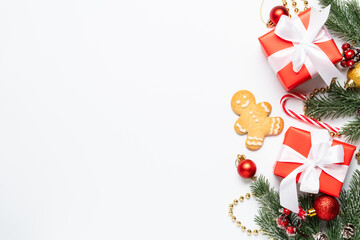 Christmas presents and holiday decorations at white background,