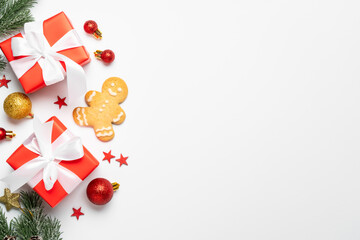 Christmas presents and holiday decorations at white background,