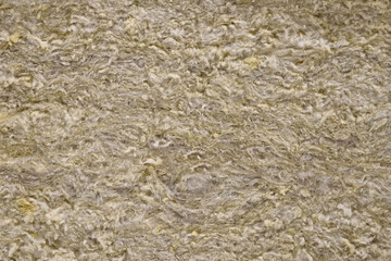 A close-up of mineral wool used for insulating walls in apartment and house construction.