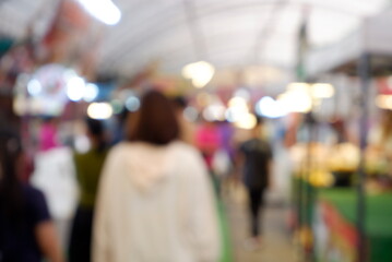 Blurred of Hazy Lantern Lights Across a Busy Night Scene