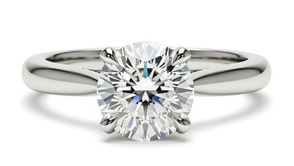 Close up of a solitaire diamond ring with a silver band on a white background